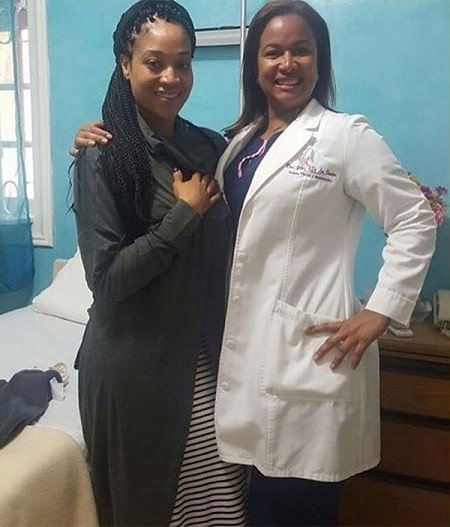 In picture, '.Mimi Faust with her plastic surgeon during her visit in Dominican Republic.